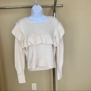 Ivory sweater with ruffle detail